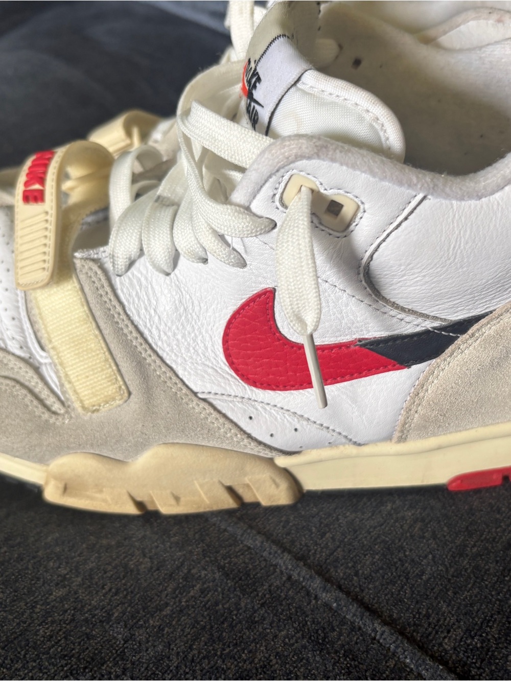 Nike White and Red High-Top Athletic Shoes with Beige Accents